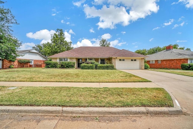 single story home with a front lawn and a garage