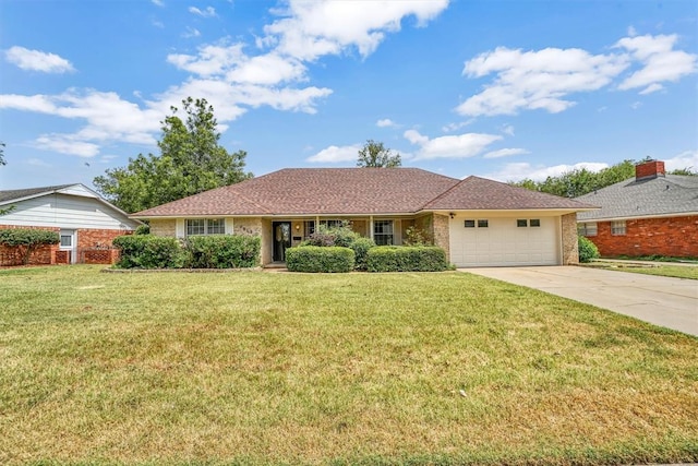 ranch-style house with a front yard and a garage