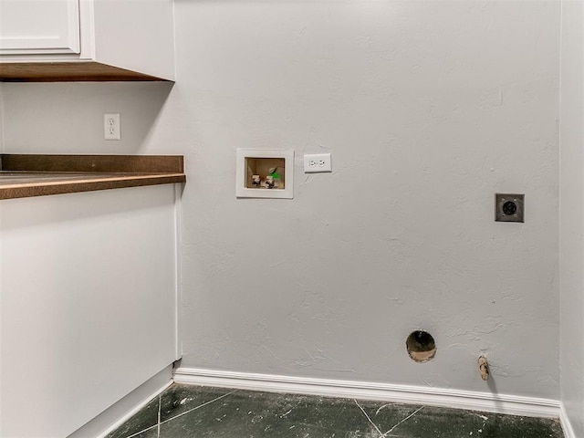 clothes washing area with hookup for a washing machine, hookup for a gas dryer, and electric dryer hookup