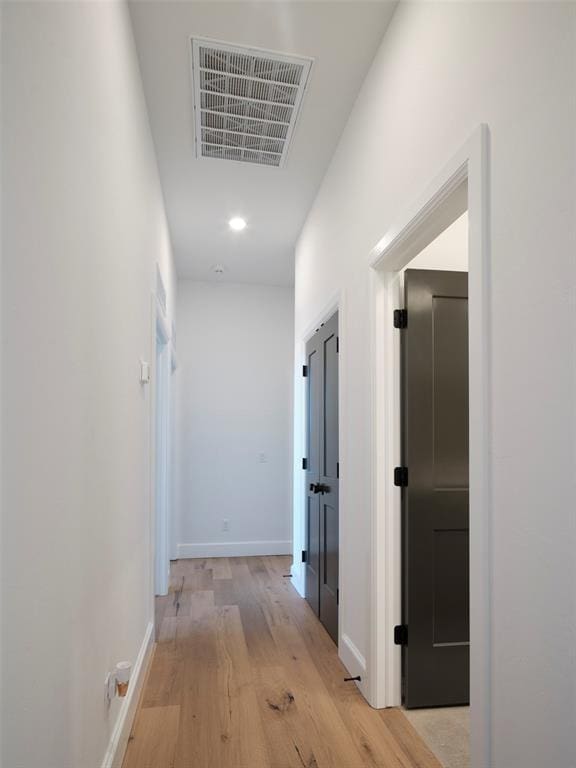 hall featuring light hardwood / wood-style floors