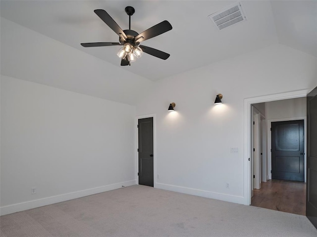 9116 SW 92nd St, Mustang, OK 73064 - carpeted spare room featuring vaulted ceiling, baseboards, and ceiling fan