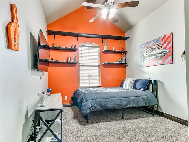 carpeted bedroom with ceiling fan and vaulted ceiling