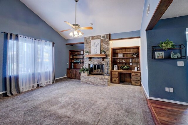 unfurnished living room with a ceiling fan, visible vents, a fireplace, baseboards, and carpet