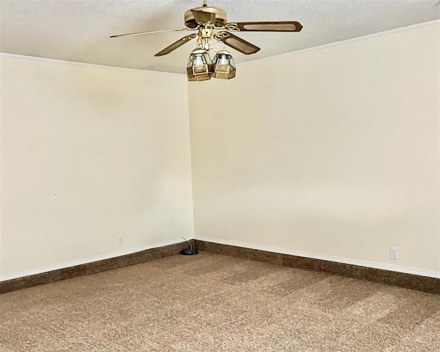 unfurnished room with a textured ceiling, carpet floors, and ceiling fan