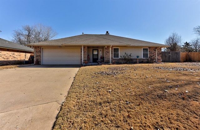 ranch-style home with a garage