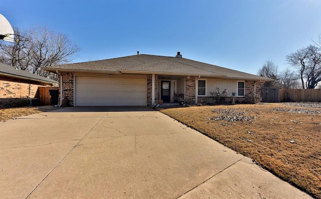 single story home featuring a garage