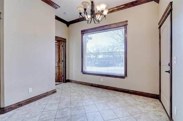 unfurnished dining area featuring crown molding and a chandelier