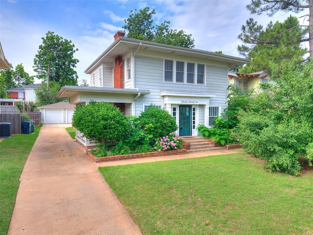 1322 NW 21st St, Oklahoma City, OK 73106 - view of front of property with a chimney, an outdoor structure, cooling unit, and a detached garage