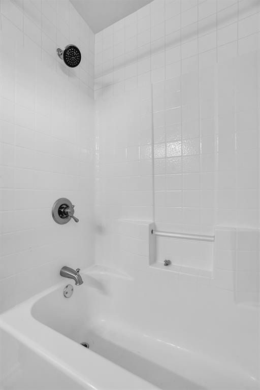 bathroom featuring bathtub / shower combination