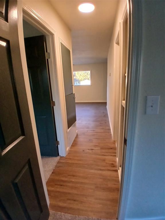 hall featuring hardwood / wood-style flooring