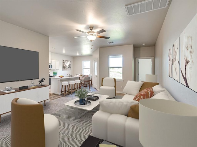 living room with ceiling fan