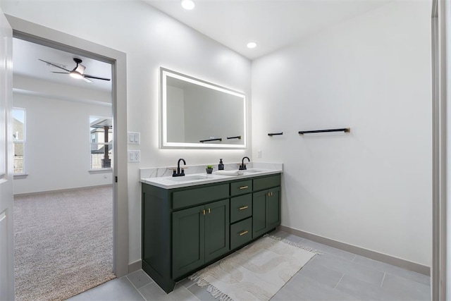 bathroom featuring vanity, tile patterned floors, and ceiling fan