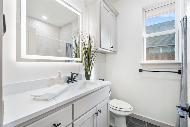 bathroom with toilet, a shower with shower curtain, tile patterned flooring, and vanity