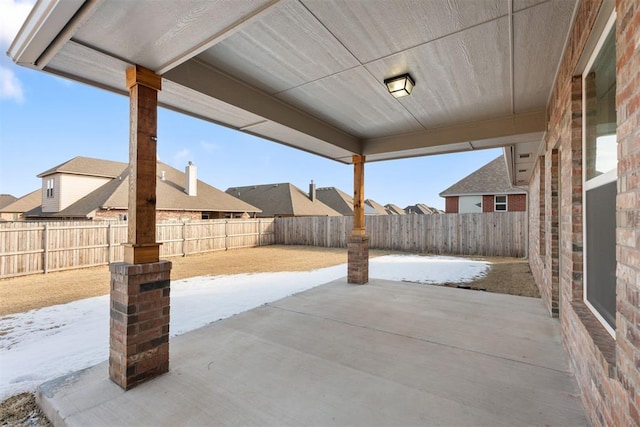 view of snow covered patio