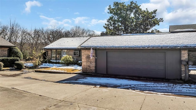 ranch-style home with a garage