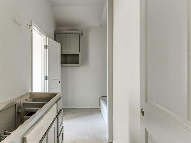 bathroom with concrete floors