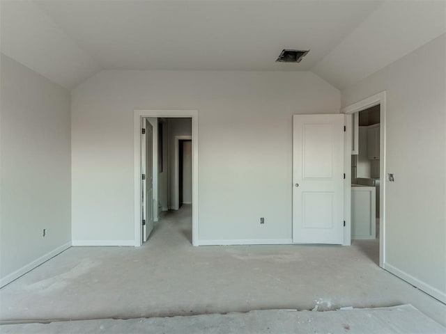 unfurnished bedroom with lofted ceiling