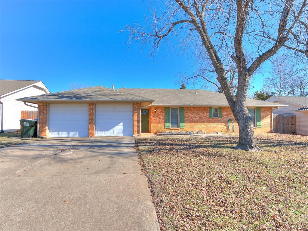 ranch-style home with a garage