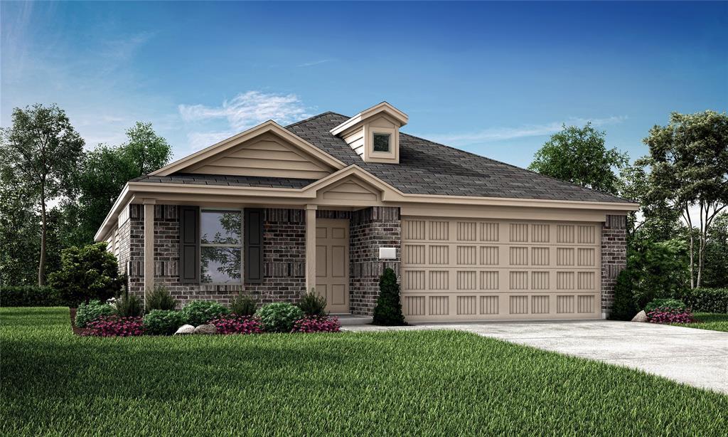 view of front of property with a front lawn and a garage