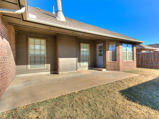 property entrance with a patio