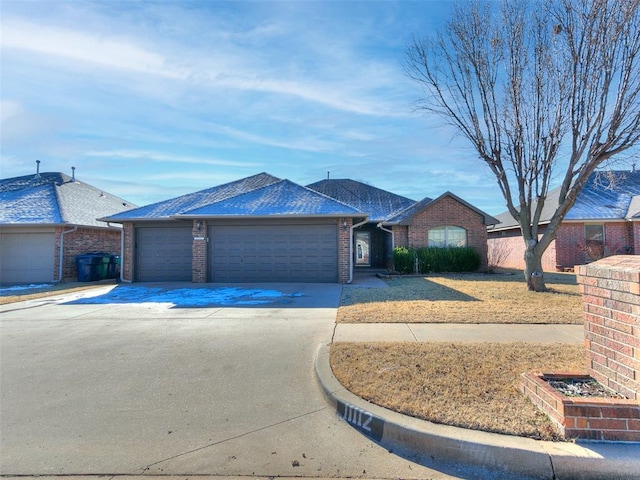 ranch-style home with a garage