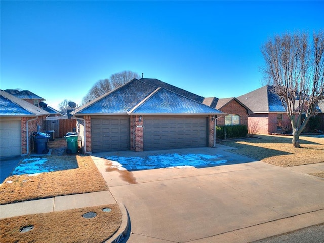 ranch-style home with a garage