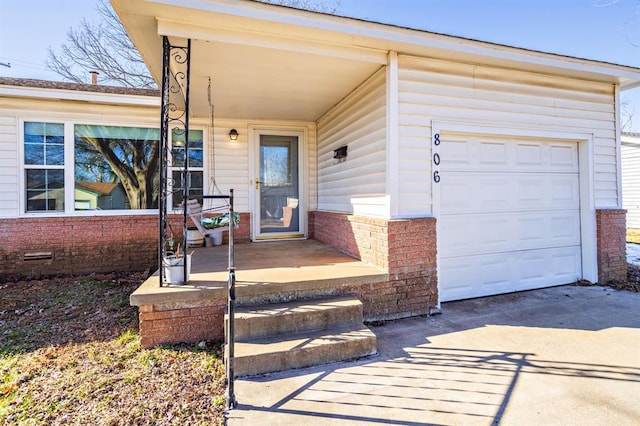 entrance to property featuring a garage