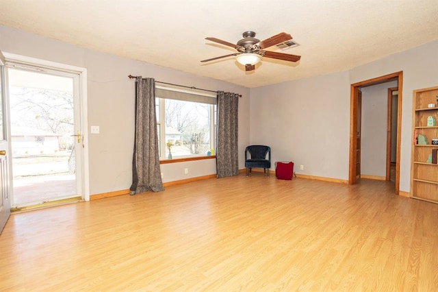 unfurnished living room with light hardwood / wood-style floors and ceiling fan