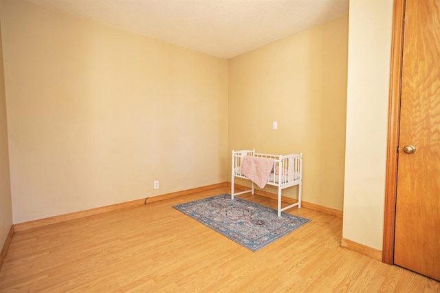 bedroom featuring wood-type flooring