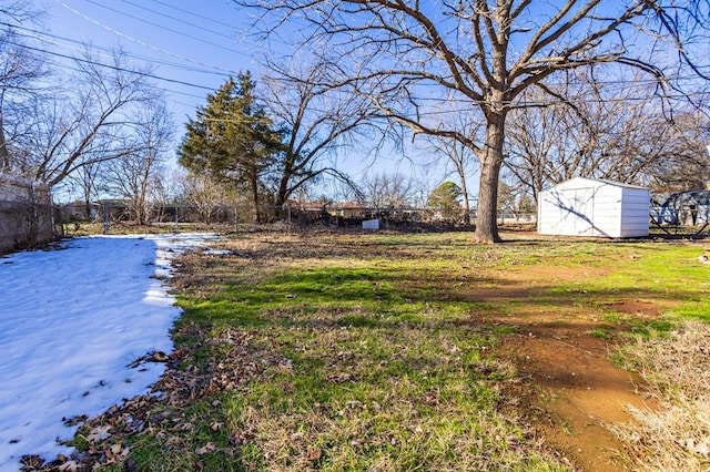 view of yard with a storage shed