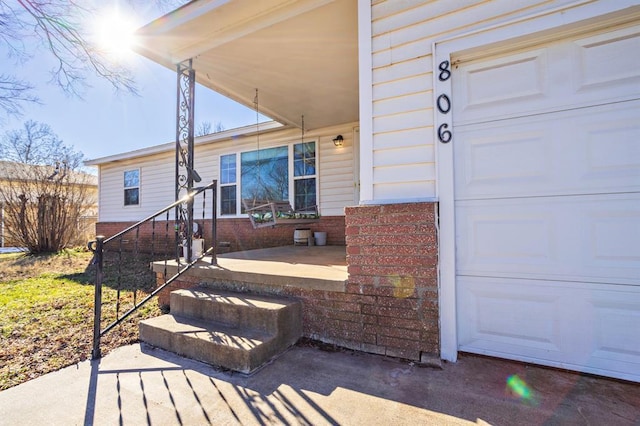 entrance to property with a garage