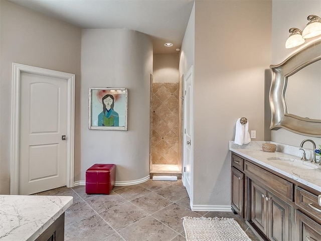 bathroom with vanity and walk in shower