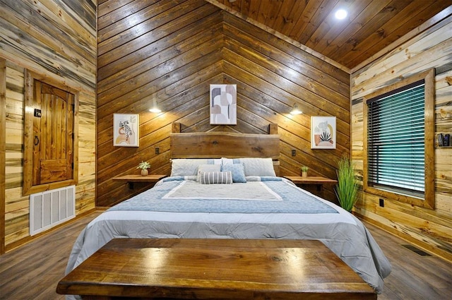 bedroom with hardwood / wood-style flooring, wooden walls, and wood ceiling