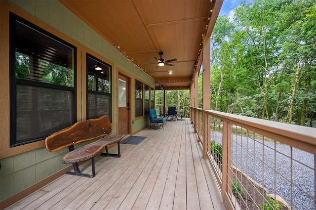 wooden terrace with ceiling fan