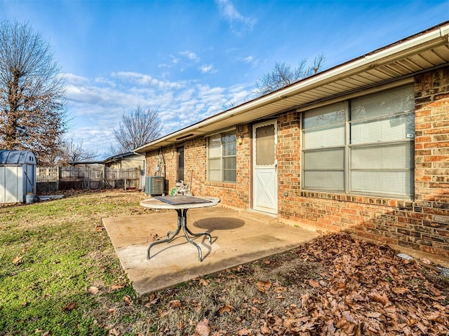 exterior space with a lawn and a patio