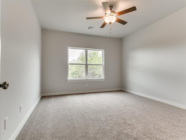 13156 Mannington Rd, Edmond, OK 73025 - carpeted empty room featuring a ceiling fan and baseboards