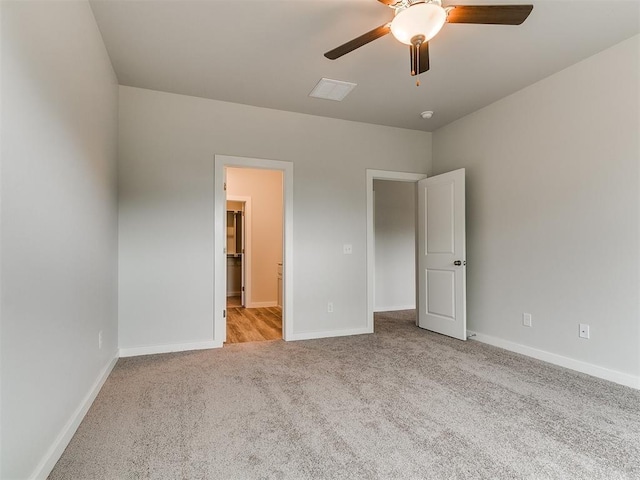 13156 Mannington Rd, Edmond, OK 73025 - unfurnished bedroom with carpet flooring, baseboards, and a ceiling fan