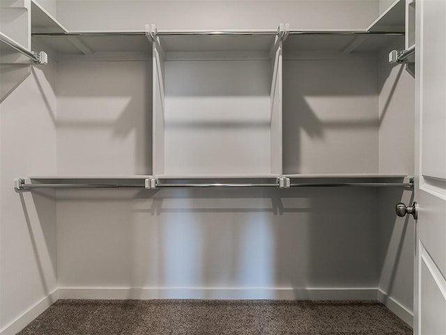 13156 Mannington Rd, Edmond, OK 73025 - walk in closet featuring carpet
