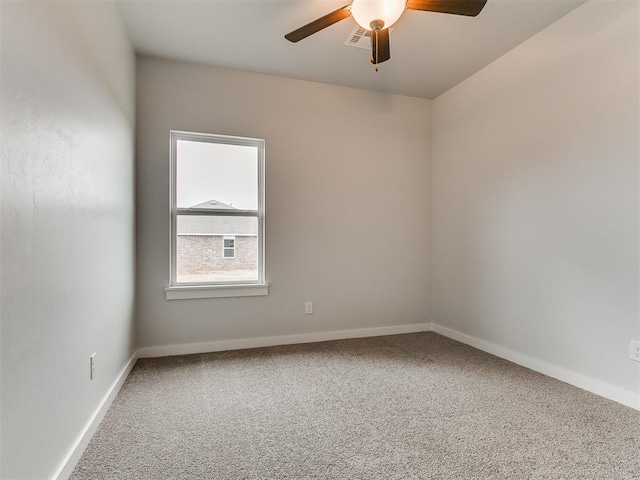 13156 Mannington Rd, Edmond, OK 73025 - carpeted empty room with a ceiling fan and baseboards