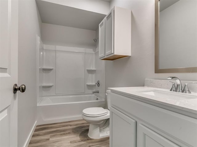 13156 Mannington Rd, Edmond, OK 73025 - bathroom with vanity, toilet, shower / washtub combination, and wood finished floors