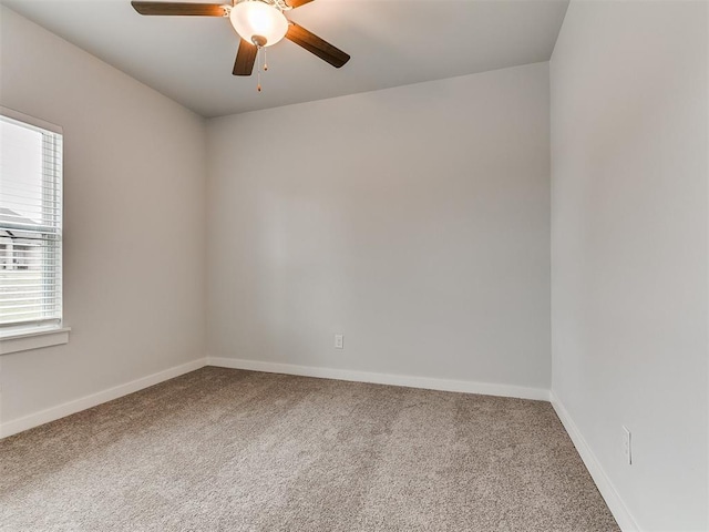 13156 Mannington Rd, Edmond, OK 73025 - carpeted empty room with baseboards and a ceiling fan
