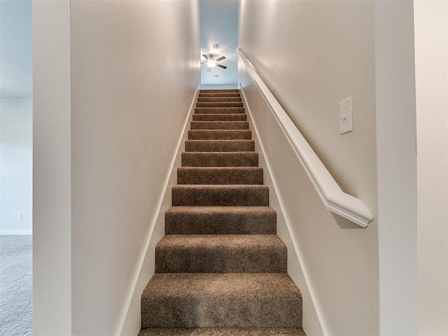 13156 Mannington Rd, Edmond, OK 73025 - staircase with a ceiling fan and carpet