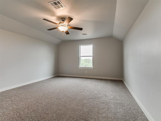 13156 Mannington Rd, Edmond, OK 73025 - unfurnished room featuring lofted ceiling, carpet, ceiling fan, and baseboards