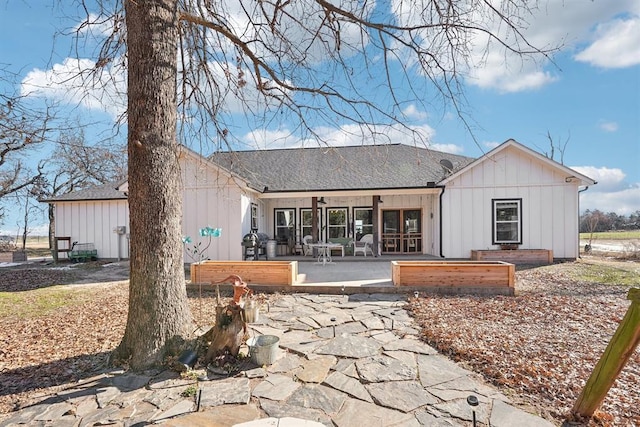 rear view of house with a patio