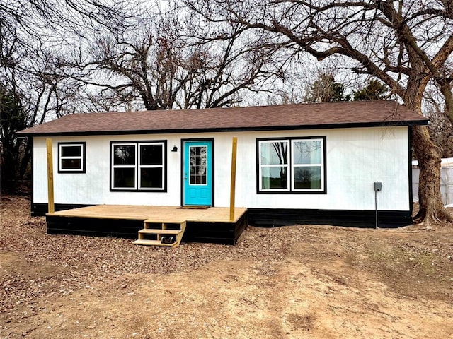 view of front of home featuring a wooden deck