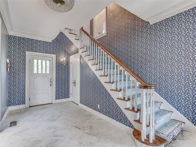 entrance foyer with ornamental molding