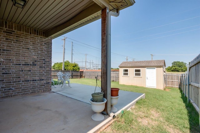 view of patio featuring a shed