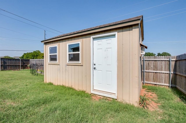 view of outdoor structure featuring a yard