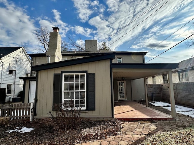 back of property with a patio area