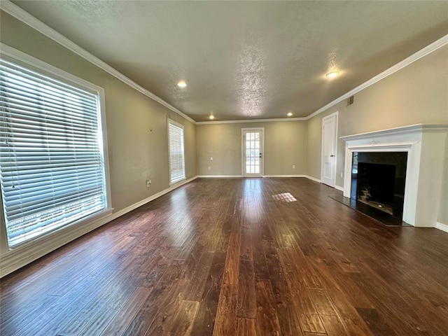 unfurnished living room with dark wood-type flooring and ornamental molding